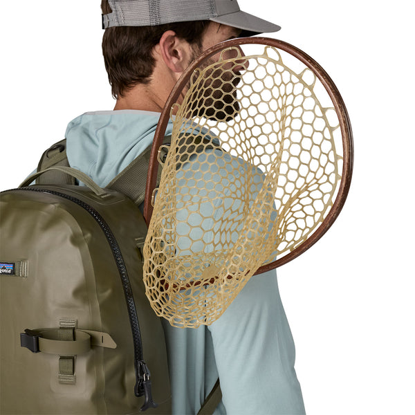 patagonia fly fishing bag Guidewater Backpack Golden Caramel/Noble Grey an embedded magnet on the pack front Patagonia - Stealth Switch Pack